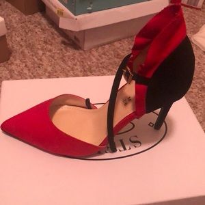 Red and Black Pump with ankle strap.